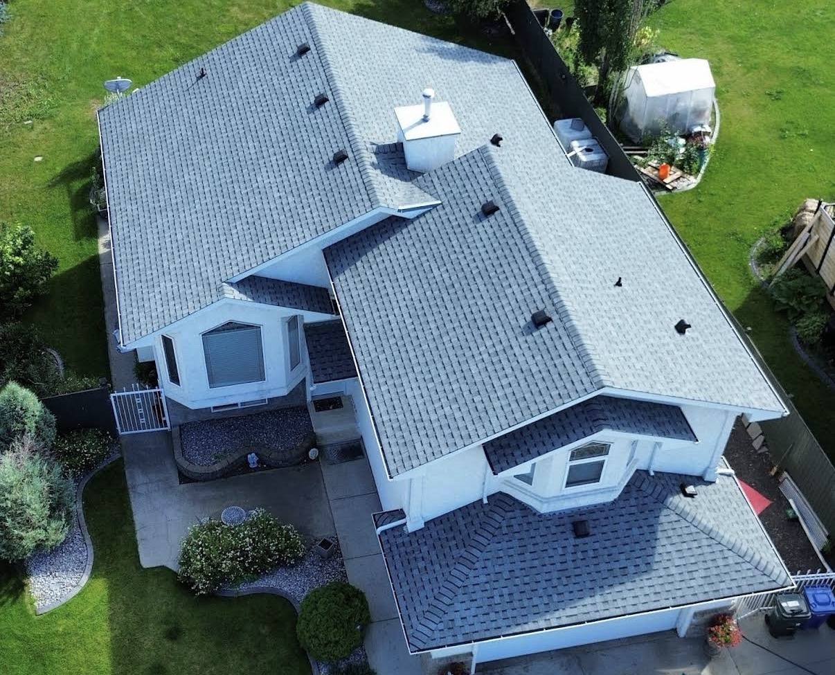 Aerial view of a completed Amiri Roofing shingle roof in Winnipeg